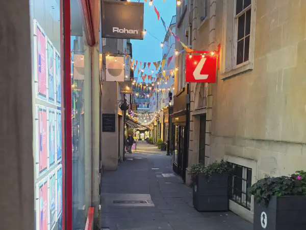 In the small alleys in Bath there are many cute shops