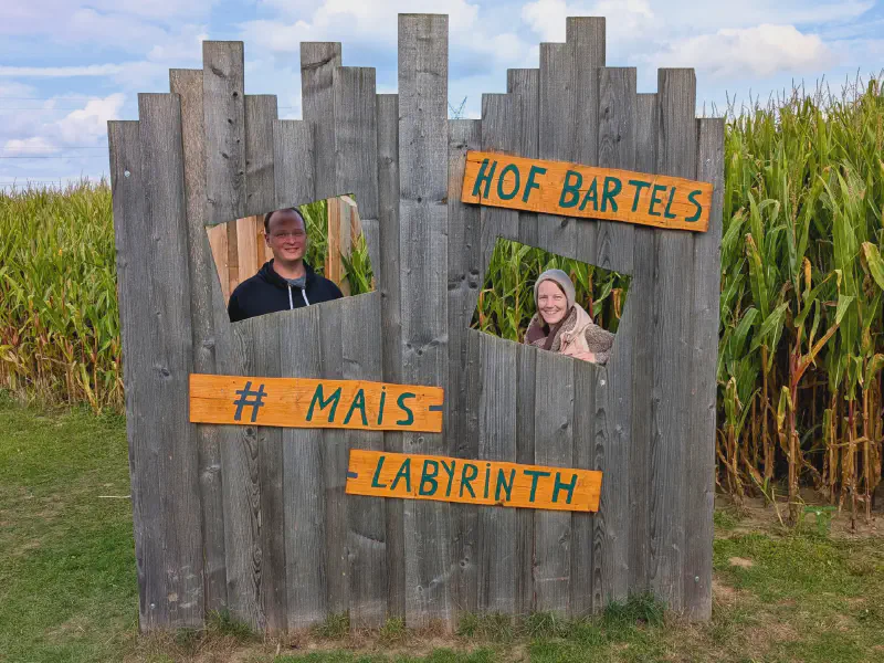 Us at the photo wall of the corn maze