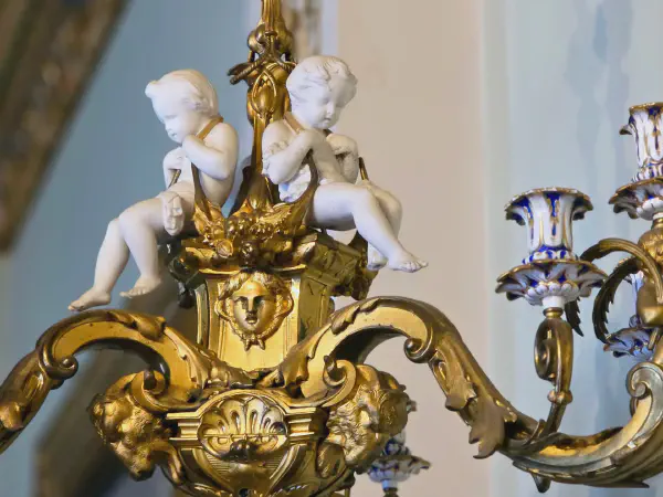 Small angel statues incorporated into a candelabra